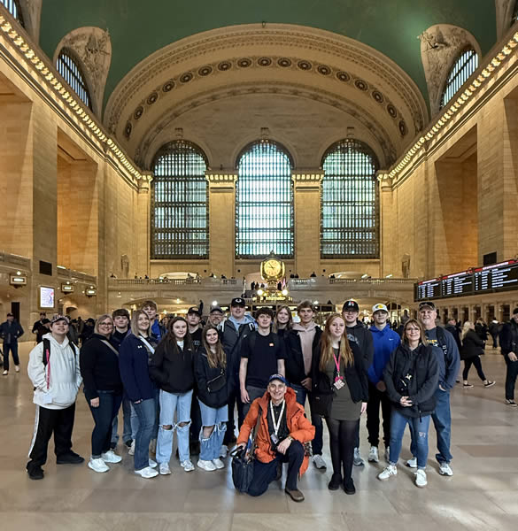 Jared leading a group of students in Grand Central Terminal