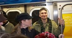 Jared in a subway car on a walking tour